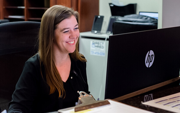 Carissa at front desk